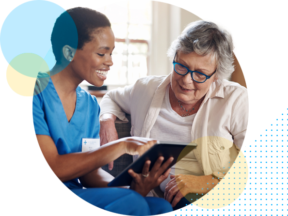Happy nurse with elderly patient - HealthStream Specialty-Focused Content