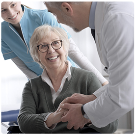 Happy female elderly patient with doctor - HealthStream