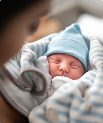 Infant swaddled in blanket - Clinical Quality Solution HealthStream